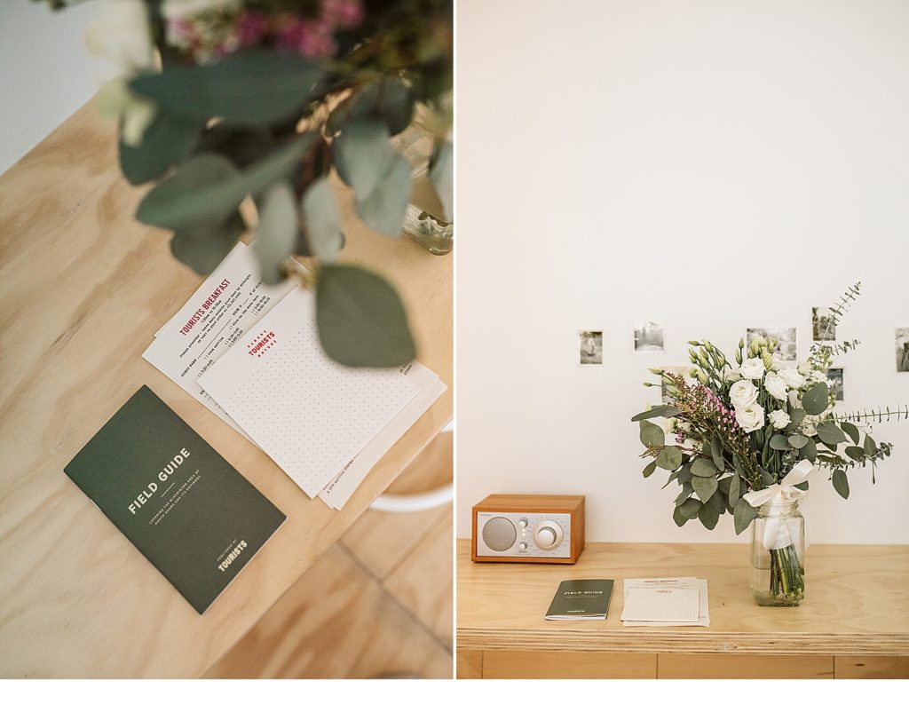 Boston elopement details including vow books and floral arrangements