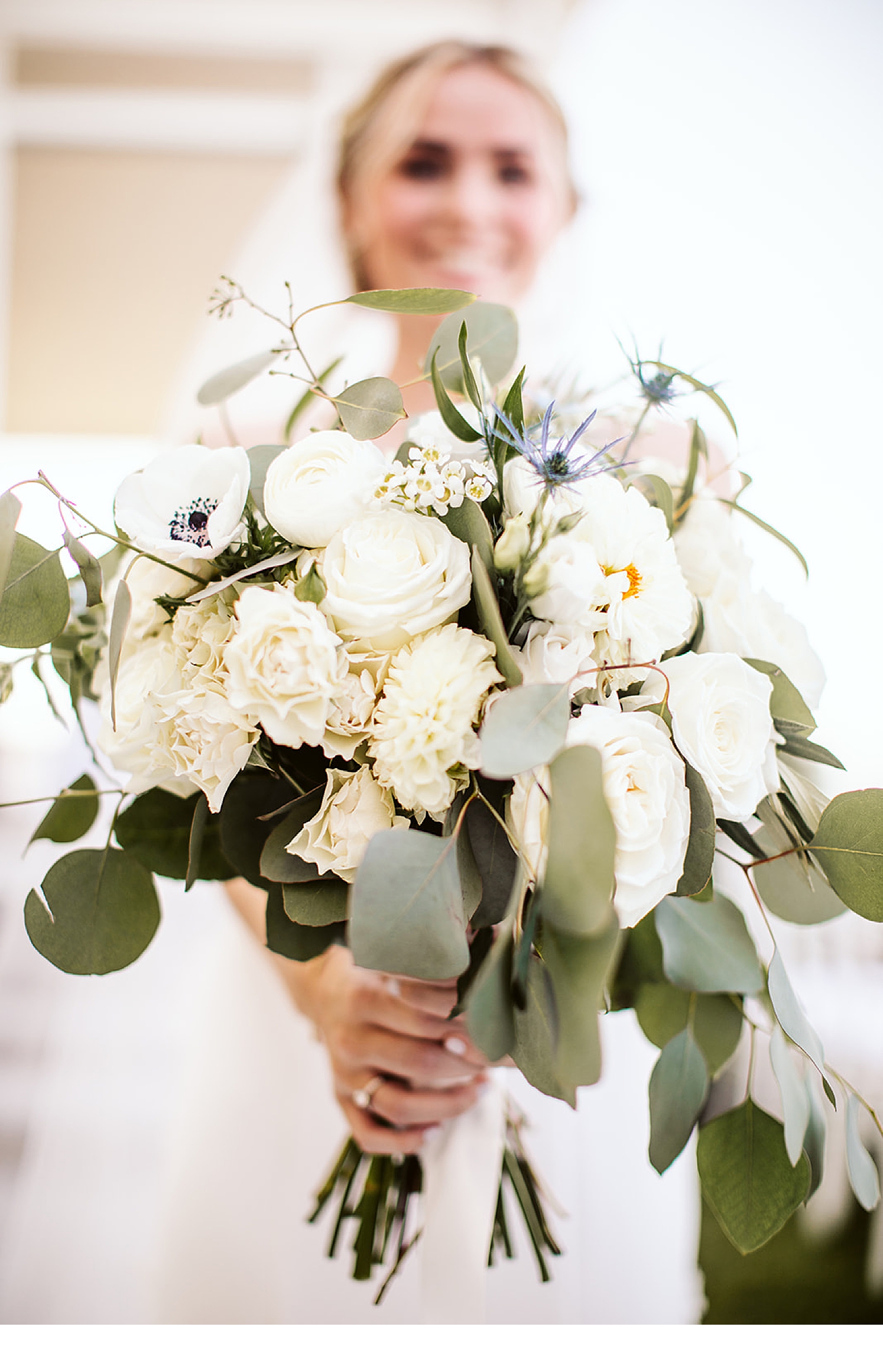 All-white-bridal-bouquet-with-eucalyptus.