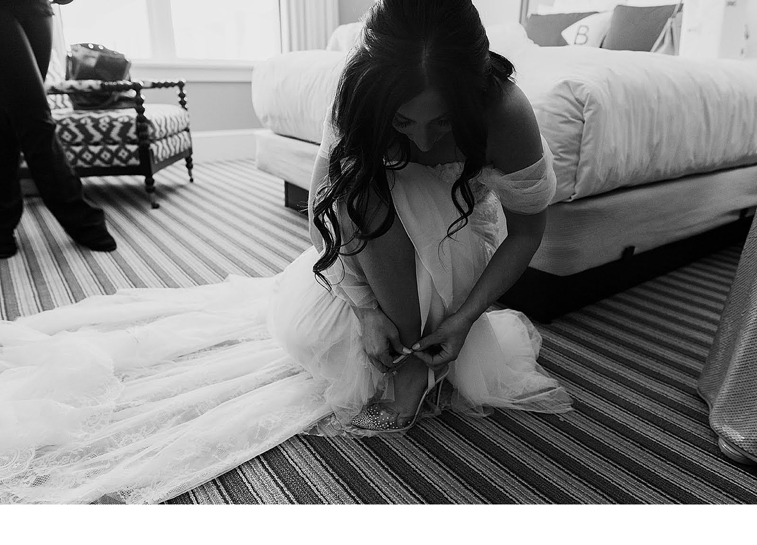 Bride putting on her shoes at Boston wedding - Kelly Stevens Photo